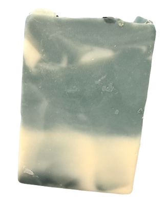 Bar of soap with a gradient from green to white on a white background