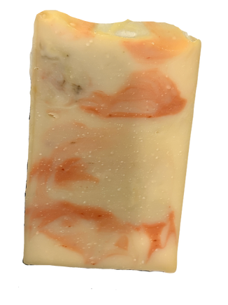 Rectangular bar of soap with orange and white swirls on a white background