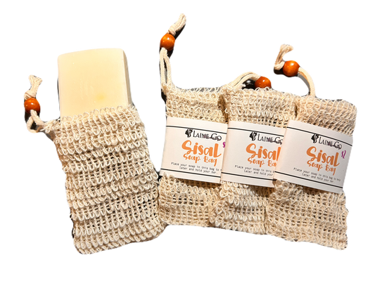 Bar of soap in a woven bag with a label on a white background
