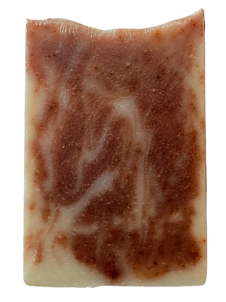 Soap bar without a label, marbled design of tan and cream.